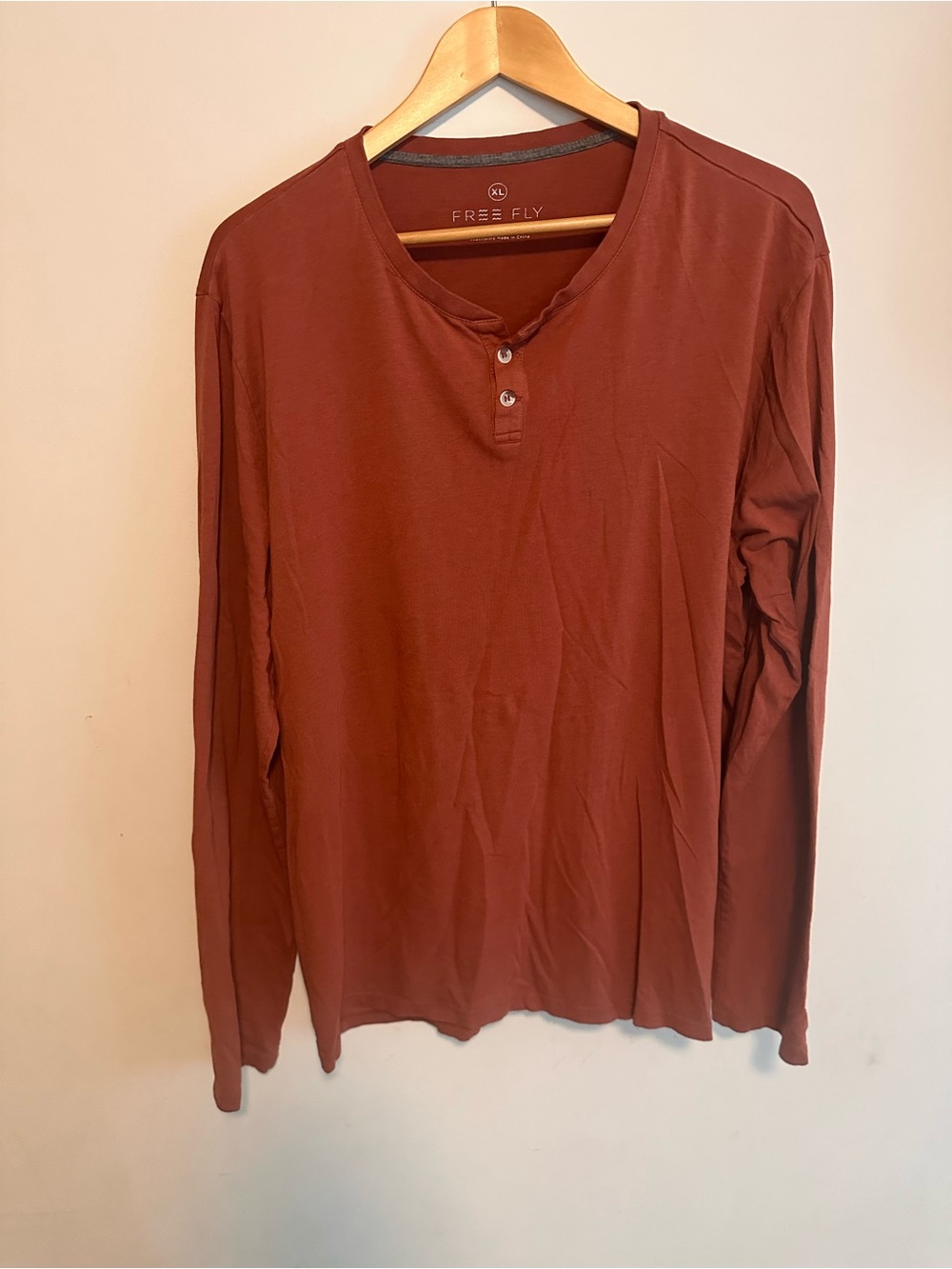 Free Fly Apparel Men's Long-Sleeve Henley in Rust Red-orange